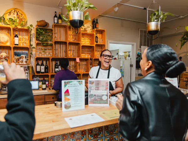 Community member laughing at a Colado Latino Network gathering