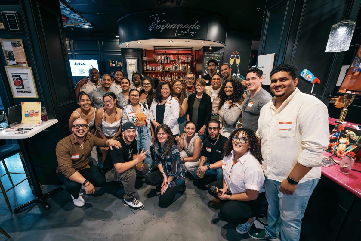 The full crowd at the Colado Latino Network event at The Empanada Lady in downtown Baltimore, May 28 2026